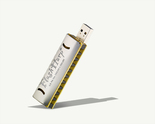 FlashHarp harmonica USB on gray background, angled.