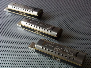 Three personalized FlashHarp harmonica USBs